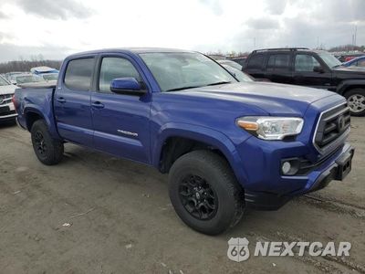 Czwarte zdjęcie samochodu z boku: 2022 TOYOTA TACOMA DOUBLE CAB VIN:3TMCZ5AN3NM499648 - miniatura