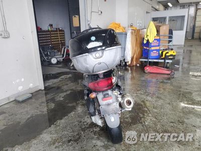Czwarte zdjęcie samochodu z boku: 2003 PIAGGIO BV 200 VIN:ZAPM289L335001284 - miniatura