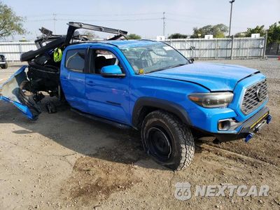 Czwarte zdjęcie samochodu z boku: 2020 TOYOTA TACOMA DOUBLE CAB VIN:3TMCZ5AN6LM310164 - miniatura