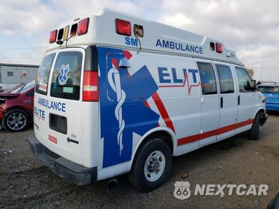Trzecie zdjęcie samochodu z tyłu: 2014 CHEVROLET EXPRESS G3500 VIN:1GBZGUCL3E1163019 - miniatura