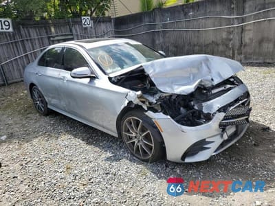 Czwarte zdjęcie samochodu z boku: 2022 MERCEDES-BENZ E 350 VIN:W1KZF8DB8NB022412 - miniatura