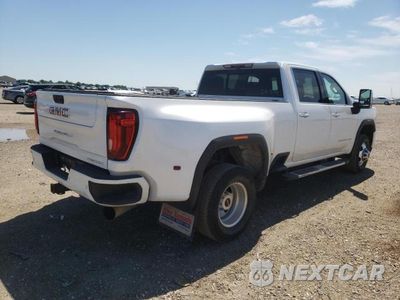 Czwarte zdjęcie samochodu z boku: 2021 GMC SIERRA K3500 DENALI VIN:1GT49WEY8MF115876 - miniatura