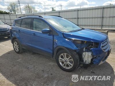 Czwarte zdjęcie samochodu z boku: 2018 FORD ESCAPE SE VIN:1FMCU9GD1JUC29663 - miniatura