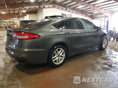 Trzecie zdjęcie samochodu z tyłu: 2019 FORD FUSION SE VIN:3FA6P0HD5KR176726 - miniatura