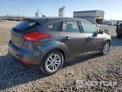 Trzecie zdjęcie samochodu z tyłu: 2017 FORD FOCUS SE VIN:1FADP3K25HL205391 - miniatura