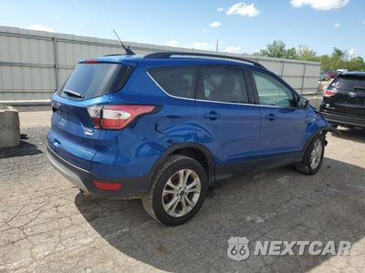 Trzecie zdjęcie samochodu z tyłu: 2018 FORD ESCAPE SE VIN:1FMCU9GD1JUC29663 - miniatura