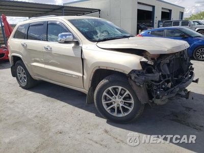 Czwarte zdjęcie samochodu z boku: 2014 JEEP GRAND CHEROKEE OVERLAND VIN:1C4RJFCM1EC298828 - miniatura