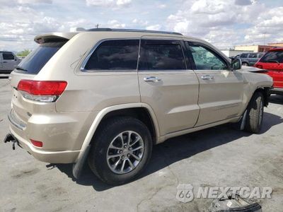Trzecie zdjęcie samochodu z tyłu: 2014 JEEP GRAND CHEROKEE OVERLAND VIN:1C4RJFCM1EC298828 - miniatura