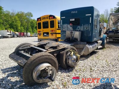 Czwarte zdjęcie samochodu z boku: 2020 KENWORTH CONSTRUCTION W900 VIN:1XKWD40X7LR411628 - miniatura
