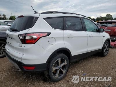 Trzecie zdjęcie samochodu z tyłu: 2018 FORD ESCAPE SEL VIN:1FMCU0HD6JUA07792 - miniatura