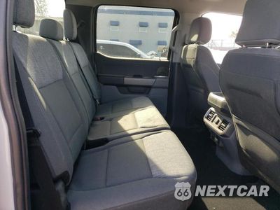 Zdjęcie 10 z 12 samochodu: 2023 FORD F150 LIGHTNING PRO VIN:1FT6W1EV8PWG34277 - miniatura