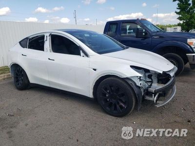 Czwarte zdjęcie samochodu z boku: 2021 TESLA MODEL Y VIN:5YJYGDEE6MF087033 - miniatura