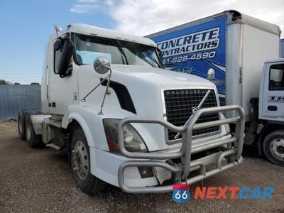 2012 VOLVO VN VNL 4V4NC9EH9CN548011 - główne zdjęcie licytacji z USA - miniatura