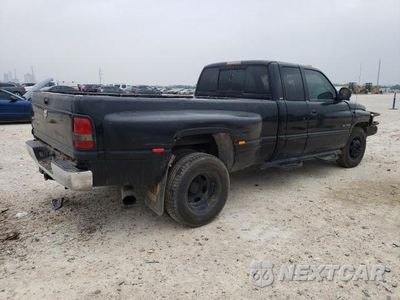 Czwarte zdjęcie samochodu z boku: 2000 DODGE RAM 3500 VIN:1B7MC3368YJ143519 - miniatura