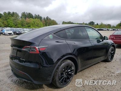 Trzecie zdjęcie samochodu z tyłu: 2023 TESLA MODEL Y VIN:7SAYGDEE6PA175892 - miniatura