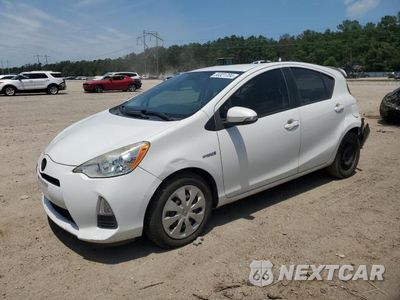 2014 TOYOTA PRIUS C JTDKDTB34E1071113 - główne zdjęcie licytacji z USA - miniatura
