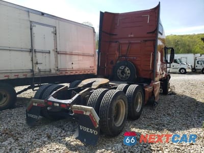 Czwarte zdjęcie samochodu z boku: 2016 VOLVO VN VNL VIN:4V4NC9EHXGN963974 - miniatura