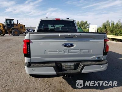 Zdjęcie 6 z 12 samochodu: 2023 FORD F150 LIGHTNING PRO VIN:1FT6W1EV8PWG34277 - miniatura