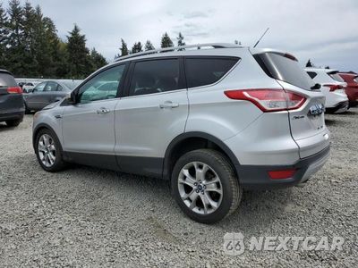 Drugie zdjęcie samochodu z przodu: 2014 FORD ESCAPE TITANIUM VIN:1FMCU0JX7EUE14112 - miniatura