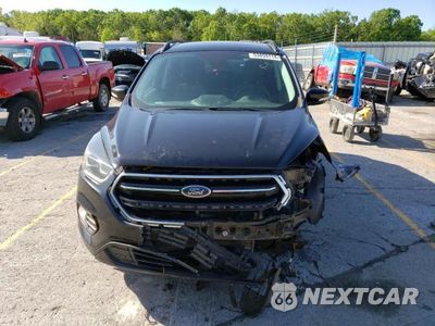 Piąte zdjęcie samochodu w środku: 2017 FORD ESCAPE TITANIUM VIN:1FMCU0J9XHUD44532 - miniatura