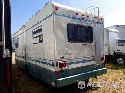 Trzecie zdjęcie samochodu z tyłu: 1999 FORD ECONOLINE E450 SUPER DUTY CUTAWAY VAN RV VIN:1FDXE40S1XHA56318 - miniatura