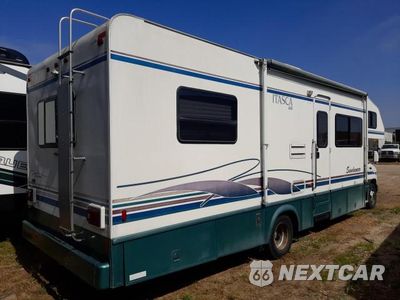 Czwarte zdjęcie samochodu z boku: 1999 FORD ECONOLINE E450 SUPER DUTY CUTAWAY VAN RV VIN:1FDXE40S1XHA56318 - miniatura