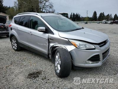 Czwarte zdjęcie samochodu z boku: 2014 FORD ESCAPE TITANIUM VIN:1FMCU0JX7EUE14112 - miniatura