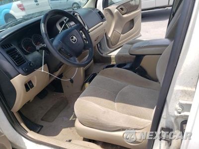 Zdjęcie 7 z 13 samochodu: 2003 MAZDA TRIBUTE LX VIN:4F2YZ04103KM54964 - miniatura