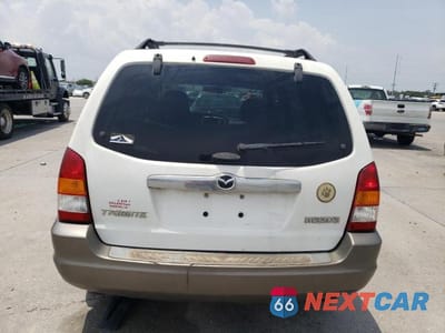 Zdjęcie 6 z 13 samochodu: 2003 MAZDA TRIBUTE LX VIN:4F2YZ04103KM54964 - miniatura