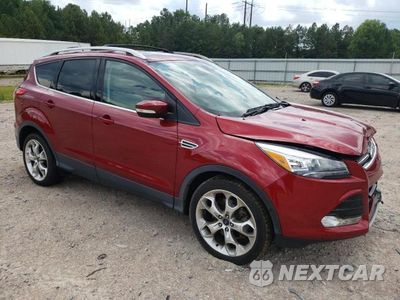 Czwarte zdjęcie samochodu z boku: 2014 FORD ESCAPE TITANIUM VIN:1FMCU0J98EUD63592 - miniatura