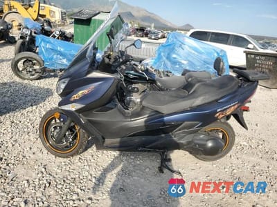 Trzecie zdjęcie samochodu z tyłu: 2019 SUZUKI AN400 A VIN:JS1DU11E0K7100125 - miniatura