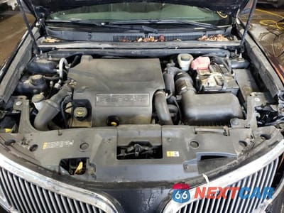 Zdjęcie 11 z 12 samochodu: 2014 LINCOLN MKS VIN:1LNHL9FT5EG607814 - miniatura