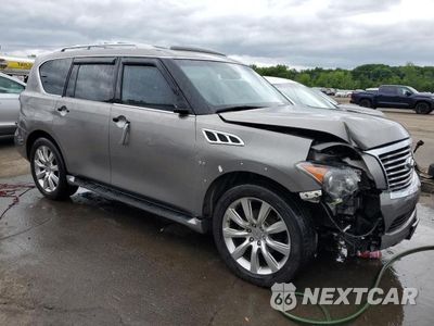 Czwarte zdjęcie samochodu z boku: 2014 INFINITI QX80 VIN:JN8AZ2NE4E9064768 - miniatura