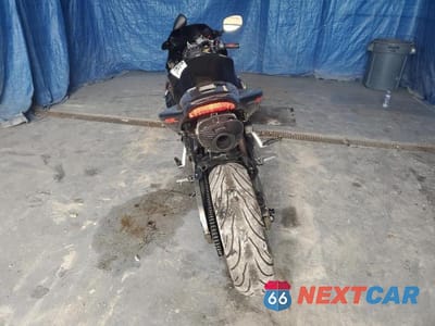Czwarte zdjęcie samochodu z boku: 2006 HONDA CBR1000 RR VIN:JH2SC57076M206959 - miniatura