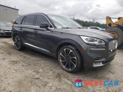 Czwarte zdjęcie samochodu z boku: 2020 LINCOLN AVIATOR RESERVE VIN:5LM5J7XC7LGL11120 - miniatura