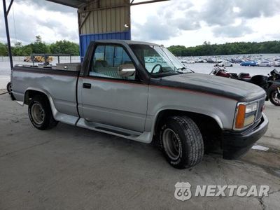 Czwarte zdjęcie samochodu z boku: 1992 GMC SIERRA C1500 VIN:1GTDC14K6NZ501634 - miniatura