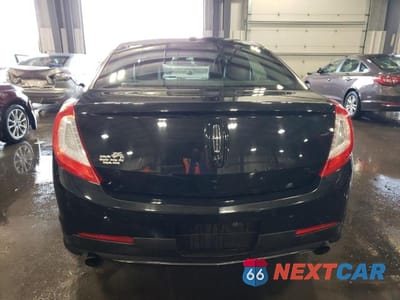 Zdjęcie 6 z 12 samochodu: 2014 LINCOLN MKS VIN:1LNHL9FT5EG607814 - miniatura