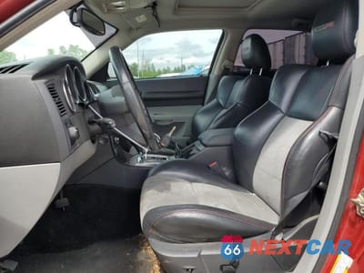 Zdjęcie 7 z 12 samochodu: 2006 DODGE MAGNUM SRT-8 VIN:2D4GV77316H219078 - miniatura