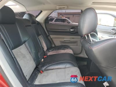 Zdjęcie 10 z 12 samochodu: 2006 DODGE MAGNUM SRT-8 VIN:2D4GV77316H219078 - miniatura