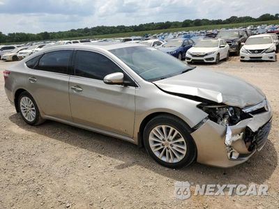 Czwarte zdjęcie samochodu z boku: 2015 TOYOTA AVALON HYBRID VIN:4T1BD1EB8FU036660 - miniatura