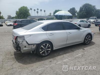 Trzecie zdjęcie samochodu z tyłu: 2016 NISSAN ALTIMA 2.5 VIN:1N4AL3AP7GC121616 - miniatura