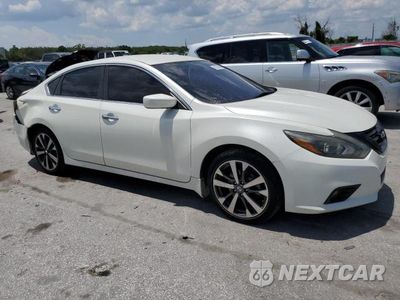 Czwarte zdjęcie samochodu z boku: 2017 NISSAN ALTIMA 2.5 VIN:1N4AL3APXHC294483 - miniatura