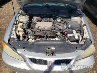 Zdjęcie 11 z 13 samochodu: 2005 PONTIAC GRAND AM SE VIN:1G2NE52E65M242017 - miniatura