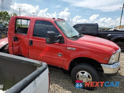 Czwarte zdjęcie samochodu z boku: 1999 FORD F350 SUPER DUTY VIN:1FTWW33F4XEB45291 - miniatura