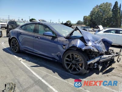 Czwarte zdjęcie samochodu z boku: 2023 TESLA MODEL S VIN:5YJSA1E60PF498849 - miniatura