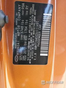 Zdjęcie 13 z 13 samochodu: 2013 HYUNDAI VELOSTER VIN:KMHTC6AD2DU111491 - miniatura