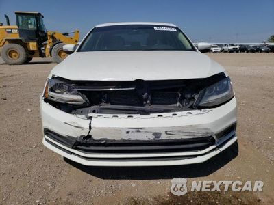 Piąte zdjęcie samochodu w środku: 2017 VOLKSWAGEN JETTA SE VIN:3VWDB7AJ2HM290288 - miniatura