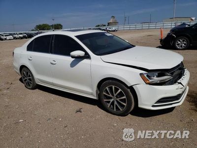 Czwarte zdjęcie samochodu z boku: 2017 VOLKSWAGEN JETTA SE VIN:3VWDB7AJ2HM290288 - miniatura