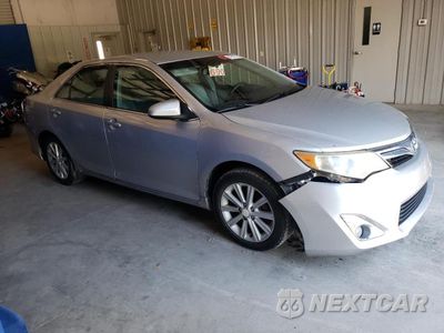 Czwarte zdjęcie samochodu z boku: 2013 TOYOTA CAMRY HYBRID VIN:4T1BD1FK9DU067878 - miniatura