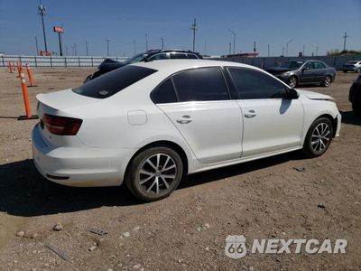 Trzecie zdjęcie samochodu z tyłu: 2017 VOLKSWAGEN JETTA SE VIN:3VWDB7AJ2HM290288 - miniatura